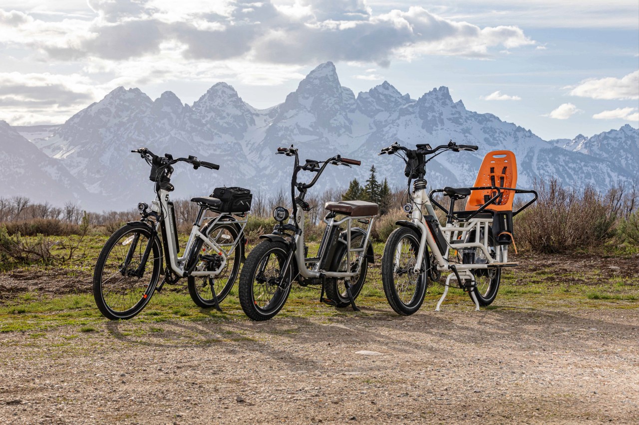E-bikes parked in front of the Grand Tetons in Jackson Hole